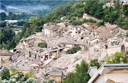  ??  ?? Flattened: The hilltop town of Pescara del Tronto was almost completely destroyed by the earthquake