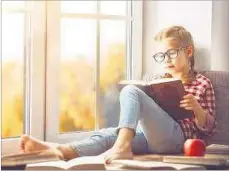  ??  ?? FAMILIA. El vínculo con la lectura se debe cultivar también en casa.