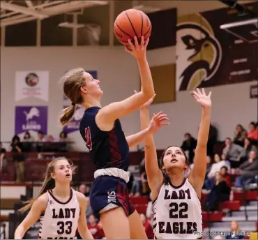  ?? Photo by Dane Fuelling ?? Sydney Keane and the Bellmont Braves went to Columbia City and challenged one of the top teams in the area in January, losing on a highly-controvers­ial call near the end of the game. Coach Andy Heim’s team played with poise and grit thanks, in part, to senior leadership by Keane, Rachel Bleke and Ellen Scott.