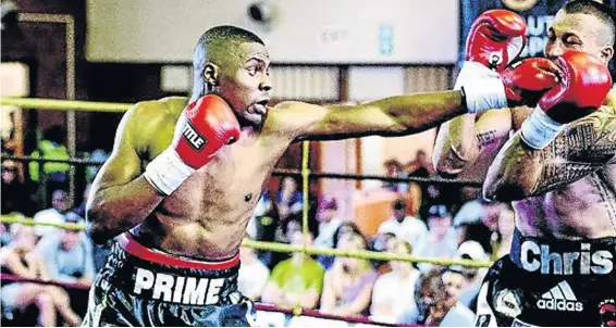  ?? / NICK LOURENS ?? Akani ‘Prime’ Phuzi and Chris ‘The Wolf’ Thompson in their topsy-turvy bout in Randburg which Phuzi won by a knockout in the second round. Thompson returns to the ring this weekend.