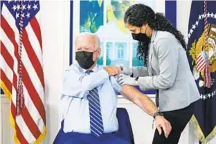  ?? ?? President Biden got a COVID booster shot Monday. On Saturday he, once again, urged Americans who have not gotten vaccinated to do so to help end the pandemic.