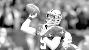  ??  ?? Drew Brees #9 of the New Orleans Saints throws a third quarter touchdown pass to Michael Thomas (not pictured) against the Philadelph­ia Eagles in the NFC Divisional Playoff Game at Mercedes Benz Superdome on January 13, 2019 in New Orleans, Louisiana. - AFP photo