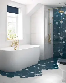  ??  ?? Right Monreale bath, £530; Victrion Superbe fixed riser kit in gold, £784, and bath shower mixer in gold, £680, BC Designs. For similar tiles, try the Luna Sapphire tile, £4 each, Bert & May