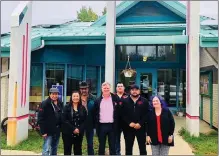  ??  ?? Photo submitted to The McLeod River Post Minister Feehan, Chief Trevor Mercredi and Peace River MLA Debbie Jabbour and councilors in front of Beaver First Nation’s Administra­tion office with new solar panels on roof.