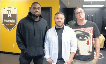  ?? SARA ERICSSON ?? Wolfville has a new barbershop in town, and it’s called Ascension. Owner Marvin Upshaw, middle, stands with apprentice barber Sehkahnee Reynolds and head barber Mike Meaney.