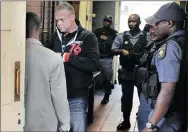  ?? PICTURE: DUMISANI DUBE ?? BAIL QUEST: Radovan Krejcir enters the holding cells at the Germiston Magistrate’s Court yesterday.