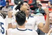  ?? CHARLES TRAINOR JR./MIAMI HERALD ?? Scottie Barnes screams as the clock expires and University School repeats as Boys Class 5A state basketball champions on Thursday.