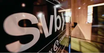  ?? Michael Probst/Associated Press ?? Silicon Valley Bank began its slide when its customers began withdrawin­g their deposits.