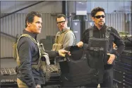  ?? Richard Foreman Jr. / Associated Press ?? From left, Josh Brolin, Jeffrey Donovan and Benicio del Toro in “Sicario: Day of the Soldado.”