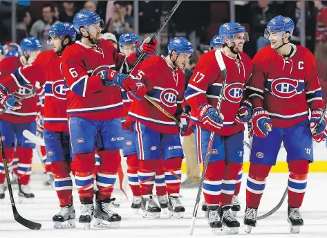  ?? ALLEN McINNIS ?? The Canadiens are all smiles after their win against Tampa Bay on Thursday. After their disastrous last season and the trade of P.K. Subban, the team has dropped 44 places to No. 98 in the rankings of 122 major pro teams in North America, according to...