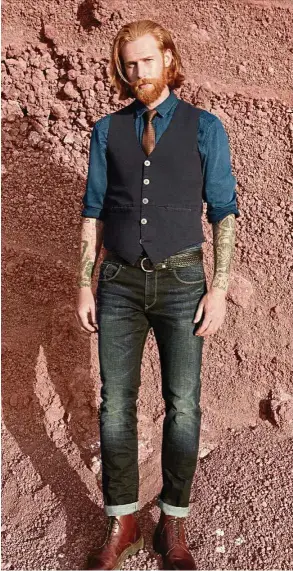  ??  ?? Go for a relaxed look by pairing your waistcoat with jeans. — Photos: dpa