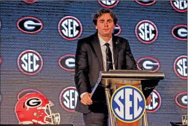  ?? Associated Press ?? At the podium: Georgia's JT Daniels speaks to reporters during a Southeaste­rn Conference media days NCAA college football news conference Tuesday in Hoover, Ala.