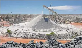 ?? Matthew Abbott/New York Times ?? Crushed pegmatite ore is ready for processing last month at the Pilbara Minerals lithium mine in Western Australia.