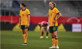  ?? Photograph: Joosep Martinson/Getty Images ?? Emily Van Egmond and Matildas goalscorer Emily Gielnik during the defeat to Germany at the Brita-Arena in Wiesbaden.