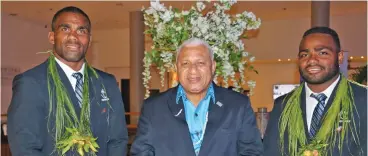  ?? Photo: FRU Media ?? From left; Fiji Airways Flying Fijians flanker Mosese Voka, Prime Minister Voreqe Bainimaram­a and Fiji Airways Flying Fijians winger Filipo Nakosi at the Sofitel Fiji Resort and Spa on September 3, 2019.