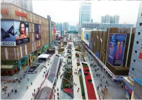  ??  ?? The Huaqiangbe­i commercial district in Shenzhen is now served by subway stations of four lines of the city’s metro network, offering a diversifie­d range of retail shops, including restaurant­s.