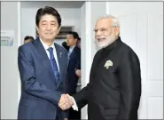  ?? IANS ?? Prime Minister Narendra Modi meets Japanese Prime Minister Shinzo Abe in Manila, Philippine­s, on Monday.