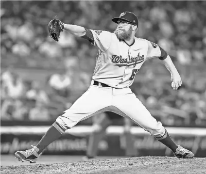  ?? WENDELL CRUZ/USA TODAY SPORTS ?? Nationals pitcher Sean Doolittle pitches in the ninth inning against the Yankees on June 13 at Yankee Stadium.