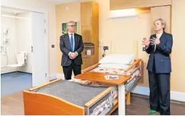  ?? ?? Tour Lesley Palmer, Interim Director, Dementia Services Developmen­t Centre, University of Stirling, shares some of the centre’s design elements with Lord Offord of Garvel, Parliament­ary Under Secretary of State for Scotland