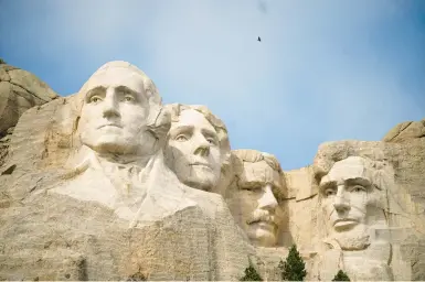  ?? DAVID ZALUBOWSKI/AP ?? The massive presidenti­al sculpture is seen Sept. 21 at the Mount Rushmore National Memorial in South Dakota.