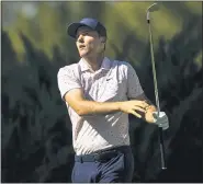  ?? CHASE STEVENS — THE ASSOCIATED PRESS ?? Russell Henley tees off at the fifth hole during the third round of the CJ Cup tournament Saturday. He leads by 3.