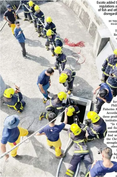  ?? PHOTOGRAPH COURTESY OF BUREAU OF FIRE PROTECTION ?? MEMBERS of the Bureau of Fire Protection conduct simulation exercises on backdraft prevention during fire-fighting operations.