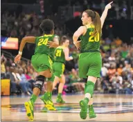  ?? Icon Sportswire / Icon Sportswire via Getty Images ?? Oregon guard Sabrina Ionescu (20) celebrates a 3-pointer in the NCAA Women’s Division I Championsh­ip Final Four game against Baylor on April 5, 2019 at Amelie Arena in Tampa, Fla.