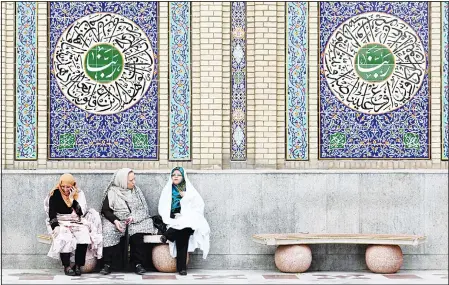  ?? (AFP) ?? Iran Shiite Muslims sit at the Emamzadeh Saleh Mosque in Tajrish Square in northern Tehran on May 22, during the Muslim Holy fasting Month of Ramadan.