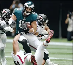  ?? JOHN BAZEMORE — THE ASSOCIATED PRESS ?? Philadelph­ia Eagles tight end Dallas Goedert (88) runs against the Atlanta Falcons during the second half of an NFL football game, Sunday, Sept. 12, 2021, in Atlanta.