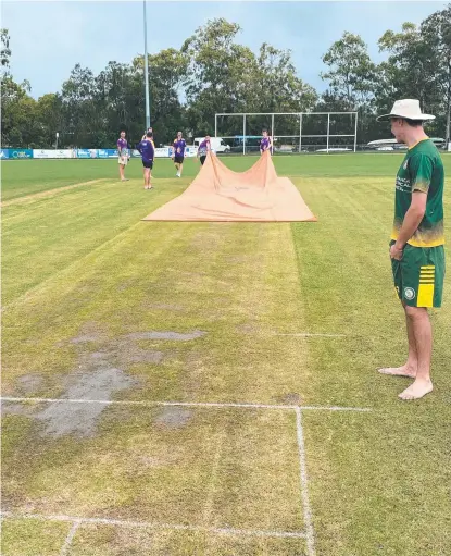  ?? ?? Rain had leaked through covers causing the match between Palm Beach and Queens to be abandoned. Pictures: Supplied