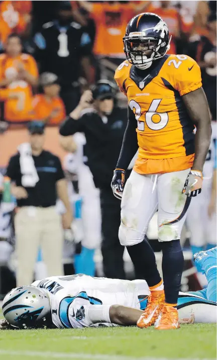  ?? — THE ASSOCIATED PRESS FILES ?? Panthers quarterbac­k Cam Newton lies on the turf after a roughing-the-passer penalty was called on Broncos free safety Darian Stewart during Thursday’s game in Denver.