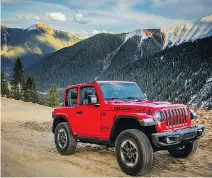  ??  ?? The 2019 Jeep Wrangler, shown here in Rubicon guise, delivers 285 horsepower and 260 foot-pounds of torque from its 3.6-litre Pentastar V-6 engine. An available 2.0-litre turbocharg­ed inline four-cylinder engine with eTorque technology delivers 270 hp and 295 ft-lbs of torque.