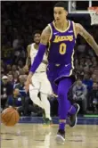  ?? Associated Press ?? Kyle Kuzma, the subject of trade talks, had 39 points for the Lakers in a loss to the 76ers Sunday.