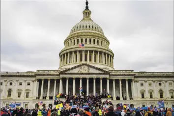  ?? JASON ANDREW — THE NEW YORK TIMES ?? A pro-Donald Trump mob invades the Capitol building in Washington on Jan. 6. An ideologica­l jumble of far-right extremists has claimed new energy after the attack on the Capitol. Now the group is debating its next moves.