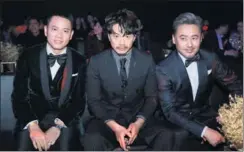  ?? PHOTOS PROVIDED TO CHINA DAILY ?? From top: The cover of GQ China’s September issue shows the 10 GQ 2017 Men of the Year. Paco Tang, publisher of GQ China, believes that men should also have a profound understand­ing of the world. Tang with Duan Yihong (middle) and Wu Xiubo, two actors...