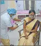  ??  ?? An anganwadi worker getting vaccine in the second phase of vaccinatio­n in Thane on Wednesday.