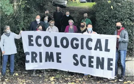  ??  ?? Above, protesters gather over plans to build homes in Tufa Field, off Englishcom­be Lane in Odd Down. Left, tensions ran high when a tractor sent to prepare Tufa Field for building was said to have caused the death of several slowworms