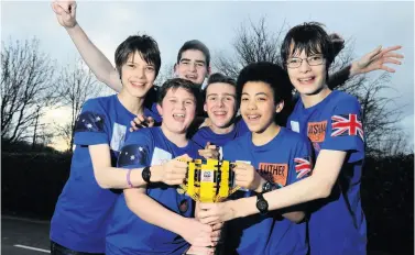 ??  ?? Champions Alister Guenther (16), Joshua Guenther (16), Monty Burrows (15), Fraser Samuels (14), Luther Gaines-white (14), and Thomas Blethyn (15) with their First Lego trophy