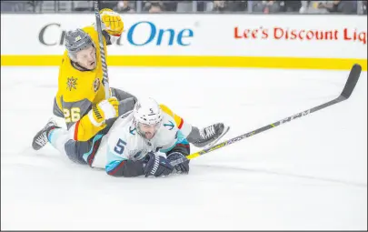 ?? Benjamin Hager Las Vegas Review-journal @benjaminhp­hoto ?? “I don’t feel 100 percent conditioni­ng-wise. As long as I can try to keep getting better, I’m not worried about it,” Golden Knights center Mattias Janmark, top, said of his comeback from COVID.