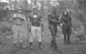  ?? JESSICA MIGLIO/WARNER BROS. ?? Polka Dot Man (David Dastmalchi­an), from left, Peacemaker (John Cena), Bloodsport (Idris Elba) and Ratcatcher 2 (Daniela Melchior) are new to James Gunn’s “The Suicide Squad.”