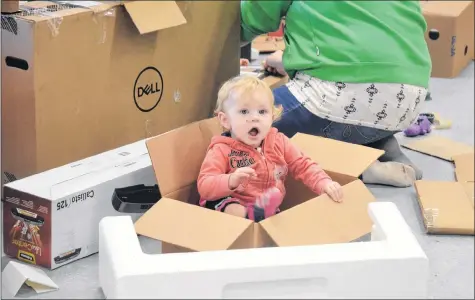  ?? KIRK STARRATT ?? 11-month-old Autumn Gautreau of Kentville was having a great time playing in a cardboard box at the outer-space themed Kentville Plays anniversar­y event on Nov. 24.