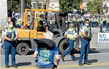  ?? ?? The Freedom Convoy parked on the parliament­ary lawn has demanded that everyone else has to live less safely, to satisfy its preference­s. – Gordon
Campbell