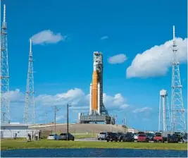  ?? CHRIS O’MEARA/AP ?? NASA’s new moon rocket sits on Launch Pad 39-B on Fridayin Cape Canaveral. NASA will go ahead with Wednesday’s launch attempt.