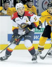  ?? STEPH CROSIER/POSTMEDIA ?? Kingston Frontenacs Cody Caron chases down Erie Otters Alex DeBrincat during the second period of Ontario Hockey League action at the Rogers K-Rock Centre in Kingston, Ont., earlier in the season.