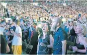  ??  ?? Rock and Roll fans enjoy the Rolling Stones No Filter concert, Friday at Hard Rock Stadium.