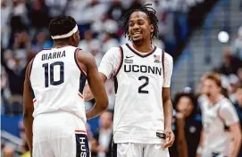  ?? Jessica Hill/Associated Press ?? UConn’s Tristen Newton now has four career triple-doubles after recording one Saturday night against Villanova.