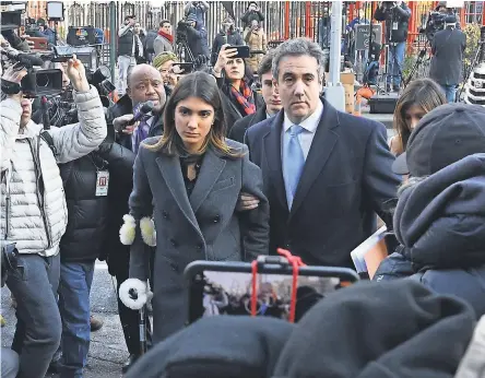  ?? ROBERT DEUTSCH/USA TODAY ?? Michael Cohen arrives at U.S. District Court in New York with daughter Samantha Blake Cohen.