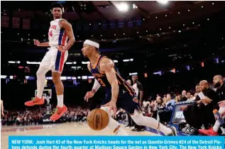  ?? ?? NEW YORK: Josh Hart #3 of the New York Knicks heads for the net as Quentin Grimes #24 of the Detroit Pistons defends during the fourth quarter at Madison Square Garden in New York City. The New York Knicks defeated the Detroit Pistons 113-111. — AFP