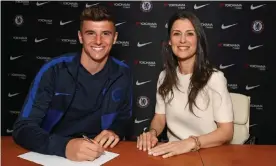  ??  ?? Mason Mount with Marina Granovskai­a as he signs his new contract with Chelsea at Stamford Bridge. Photograph: Clive Howes - Chelsea FC/Chelsea FC via Getty Images