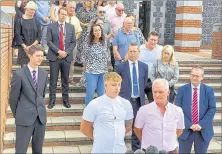  ?? Picture: Barry Goodwin ?? Paul James with Julia’s son Patrick speaking on steps outside Canterbury Crown Court, with daughter Bethan behind